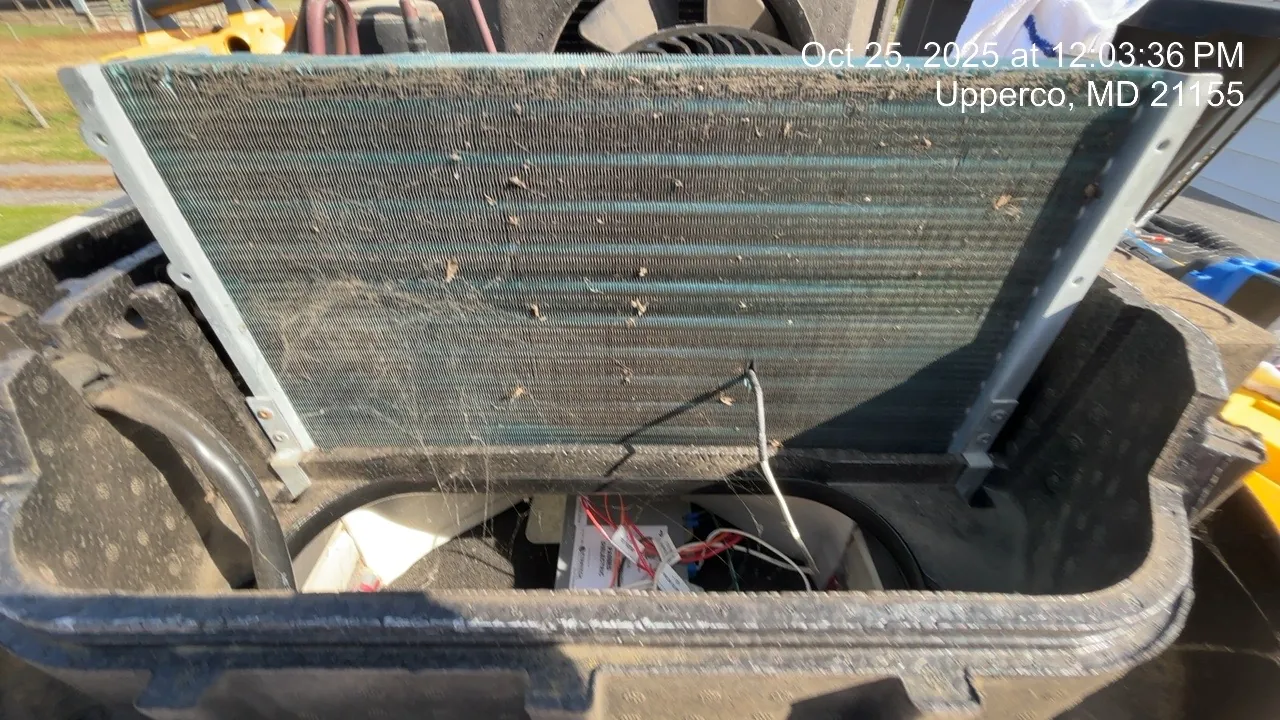 Dirty RV rooftop air conditioner evaporator coil being inspected during mobile RV AC diagnostic service by Wayfare Mobile RV Repair near Harford County, MD.